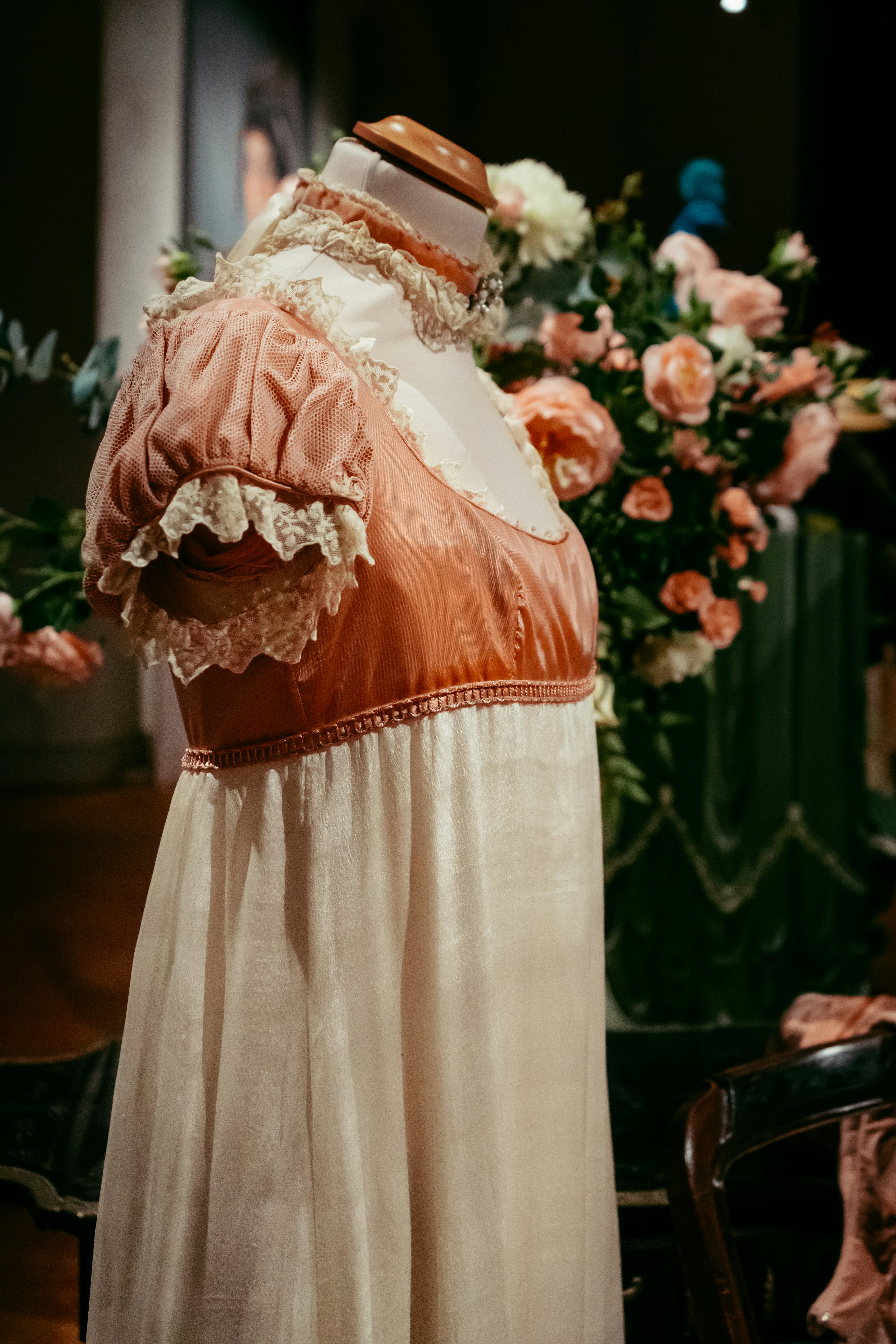 woman in red and white floral dress